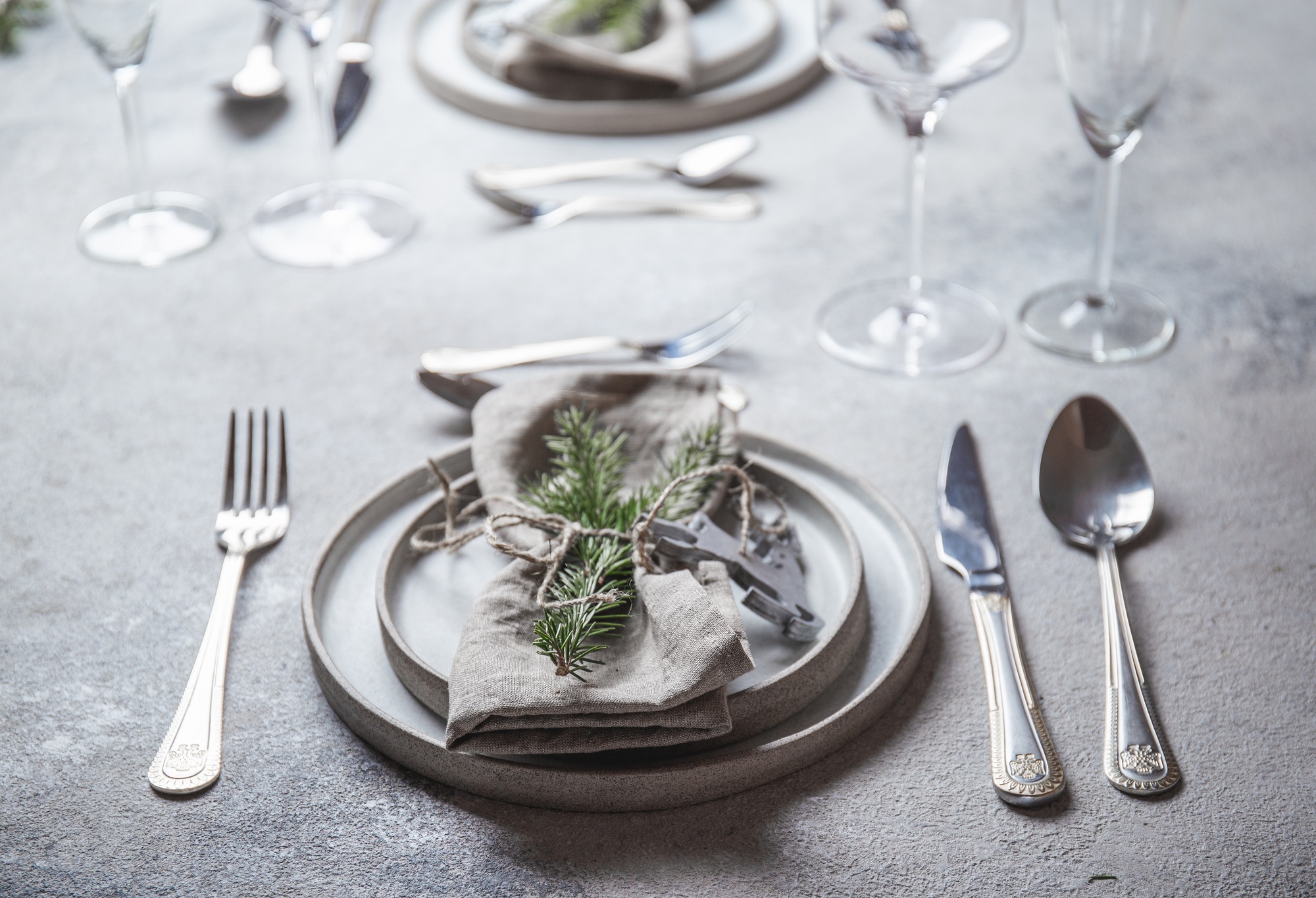Christmas table cutlery set with holiday decoration. Top view, copy space.
